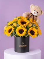 Girasoles con peluche oso